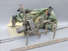 An electric motorised pigeon magnet in canvas carry case.