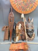 A quantity of tribal items to include masks