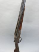 Victor Sarasquetta 20 bore side by side shotgun with named and engraved locks,