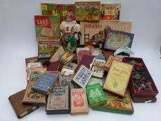 A large collection of playing cards, dominoes,