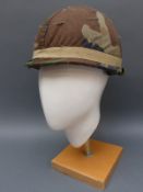 Three modern military helmets