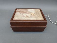 A retro Becotel telephone in purpose built fitted box with gun dog decoration