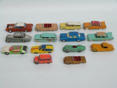 Fourteen Dinky Toys diecast model cars including Connaught 236, Jaguar 157,