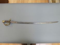 A Victorian cavalry sword with pipe back blade