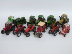 Twelve Britains and similar 1:32 scale diecast and plastic model John Deere, Massey Ferguson,
