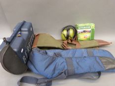 A collection of shotgun related accessories including various 12 bore chokes, Beretta carry case,