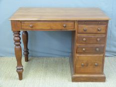 A possibly teak pedestal desk,