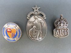 A hallmarked silver ARP badge,