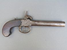 Percussion hammer action pistol with indistinctly named and engraved locks, thumb slide safety,