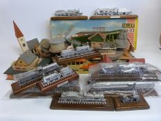Twelve 00 gauge pewter model locomotives together with a collection of 00 gauge buildings