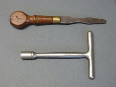T shaped nipple wrench/ key together with a wooden handle brass collared screwdriver, 15.5cm long.