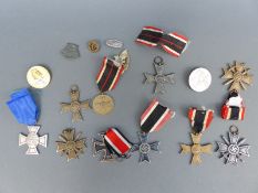 A quantity of WWII German medals,