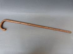A vintage horse measuring stick with fold-out brass spirit level