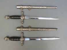 Two replica Nazi German style naval daggers