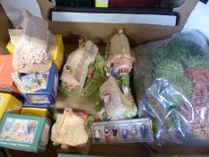 A quantity of Lilliput Lane and related items to include boxed vehicles, miniatures, people, trees,