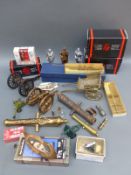 A quantity of collectable model cannon, swords,