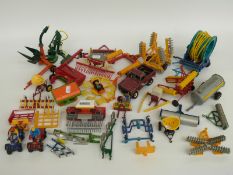 Thirty Britains and similar 1:32 scale diecast and plastic model farm vehicles and implements