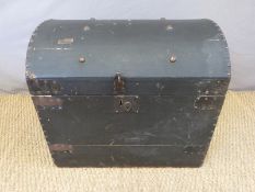 A vintage dome-topped trunk,