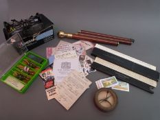 Three small modern woodworking planes, brass compass/sextant, slide rules,