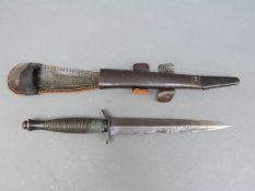 Fairbairn Sykes 3rd pattern knife with ribbed grip and marked 'William Rodgers Sheffield England'