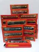 Twenty-one Hornby 00 gauge carriages including a Royal Mail Operating Mail coach set,