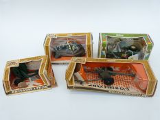 Four Britains 1:32 scale diecast model military vehicles and guns, 105mm Pack Howitzer 9724,