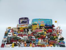 A large collection of Corgi, Dinky, Matchbox and similar diecast model vehicles and accessories,