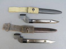 Two Lee Enfield no 9 bayonets, one marked M49 the other M50,