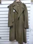 An Army greatcoat marked 9 and 5'11 - 6'0