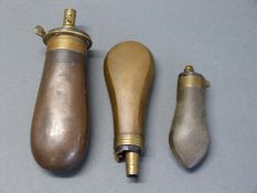 Three copper and brass pistol powder flasks the largest by Sykes 14.5cm long.