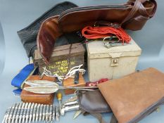 A quantity of gun slips, Eastern style daggers, brass compass,