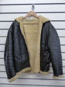 A black leather flying jacket,