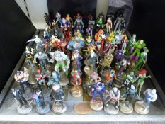 Seventy-two DC Comics chess set figures and figurines, one in original box,