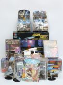 Twenty-three Star Trek model figures and games including Dinky Toys USS Enterprise,