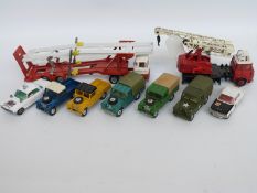 Nine Corgi Toys and Corgi Major Toys diecast model vehicles including military car, Land Rovers,