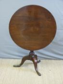 A 19thC mahogany circular table,