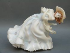 A collection of Lladro and Copenhagen figures