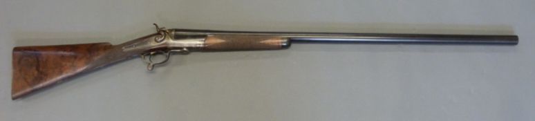 E M Reilly & Co of London 8 bore single barrelled hammer action shotgun with rotary underlever,