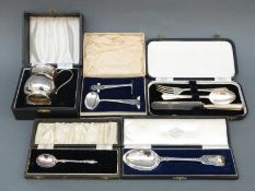 A cased Niello ware spoon stamped Margrett Bangkok, length 18cm, in similarly named box,