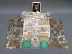 A quantity of sundry coinage including WWII era, together with WWII era bank notes, B.A.F.