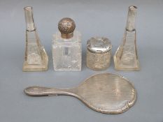 Four hallmarked silver mounted dressing table items,