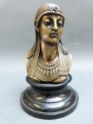 A 19thC cast bronze Egyptian revival bust with sapphire style headband,