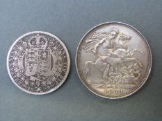 An 1889 Victorian crown with blue toning together with an 1889 half crown