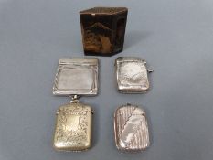 A hallmarked silver vesta, B'ham 1905, two further plated vestas,