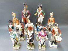 A quantity of Continental ceramic military figures
