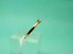 An 18ct gold ring set with a princess cut diamond of approximately 0.15ct (Size O), weight 3.