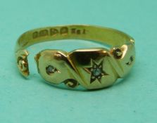 An 18ct gold ring set with old cut diamonds, 2.