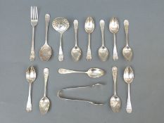 A set of ten Victorian hallmarked silver teaspoons and tongs,