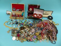 A collection of costume jewellery to include beaded necklaces, gold plated glasses, brooches,