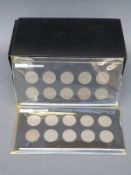 An amateur collection of English florins mounted in cards, ranging from 1954-1959,